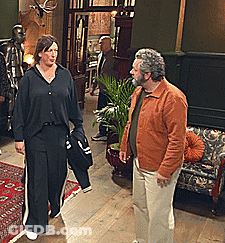 Man And Woman Standing In Hallway GIF