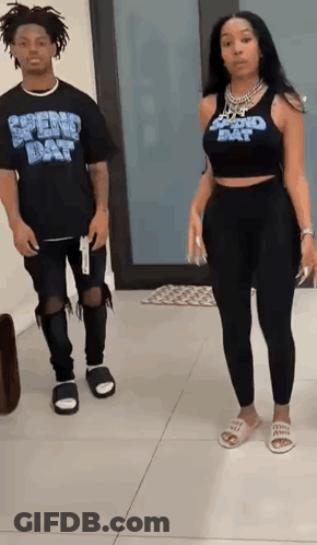 Man And Woman Standing In Hallway GIF