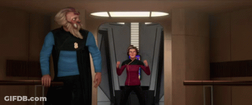 Man And Woman Standing In Hallway GIF