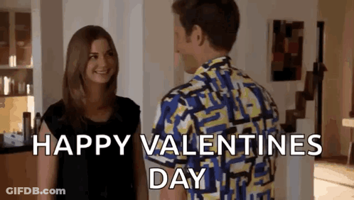 Man And Woman Standing In Living Room Man In Colorful Shirt GIF
