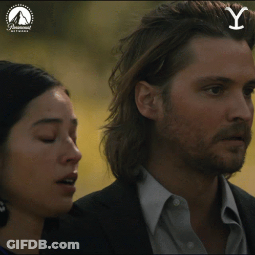 Man And Woman Standing In Paramount Network Ad GIF