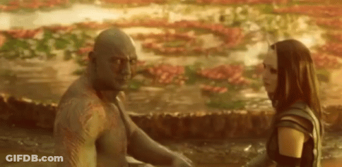 Man And Woman Standing In Puddle GIF