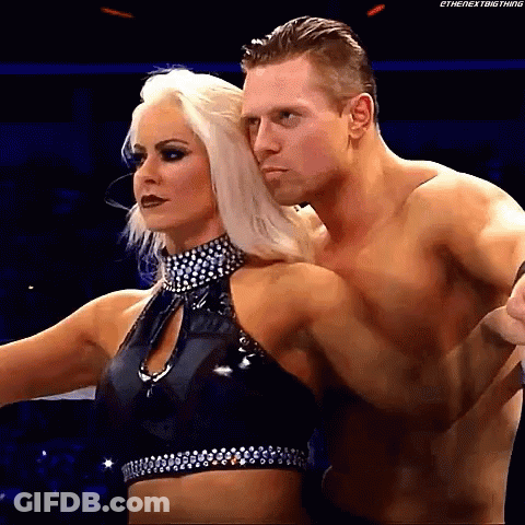 Man And Woman Standing In Ring GIF