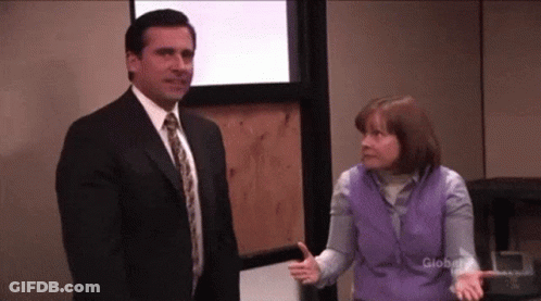 Man And Woman Standing In Room GIF