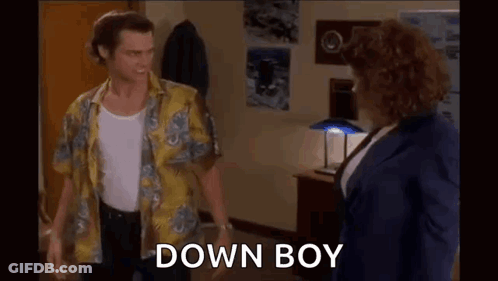 Man And Woman Standing In Room Man In Yellow Shirt GIF