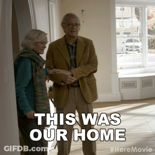Man And Woman Standing In Room GIF