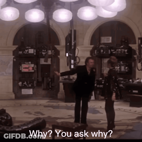 Man And Woman Standing In Room With Why You Ask Why GIF