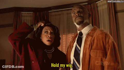 Man And Woman Standing Man Says Hold My Wig GIF