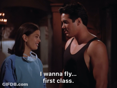 Man And Woman Standing Man Says I Wanna Fly First Class GIF