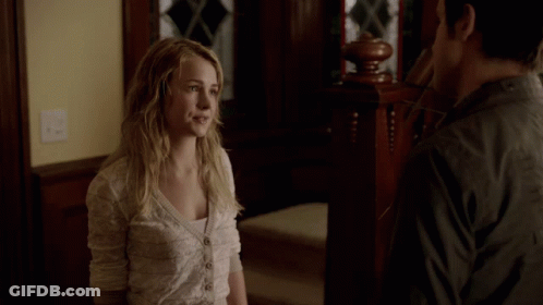 Man And Woman Standing Next To Each Other GIF