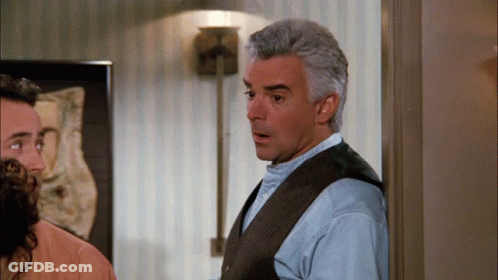 Man And Woman Standing Next To Each Other GIF