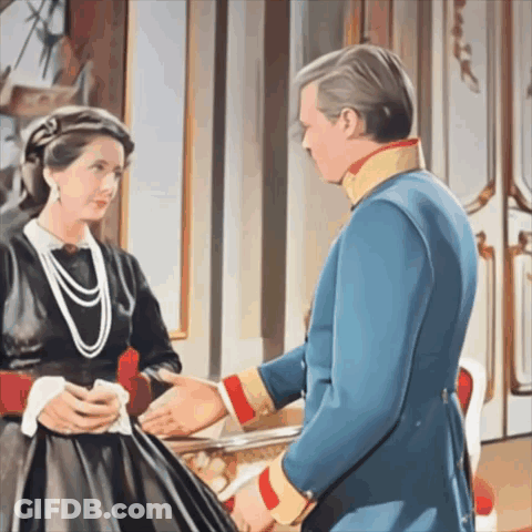 Man And Woman Standing Next To Each Other In Room GIF