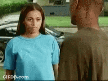 Man And Woman Standing Next To Each Other GIF
