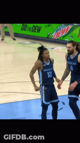 Man And Woman Standing Next To Each Other GIF