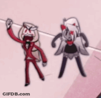Man And Woman Standing Next To Each Other Pink Surface GIF