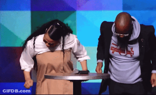 Man And Woman Standing Next To Each Other GIF