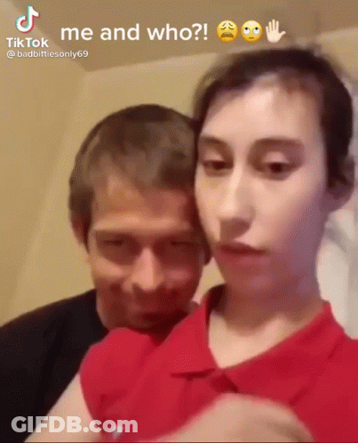 Man And Woman Standing Next To Each Other GIF