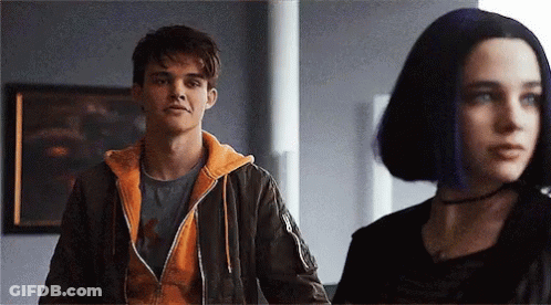 Man And Woman Standing Next To Each Other GIF