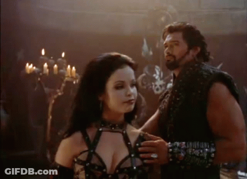 Man And Woman Standing Next To Each Other GIF