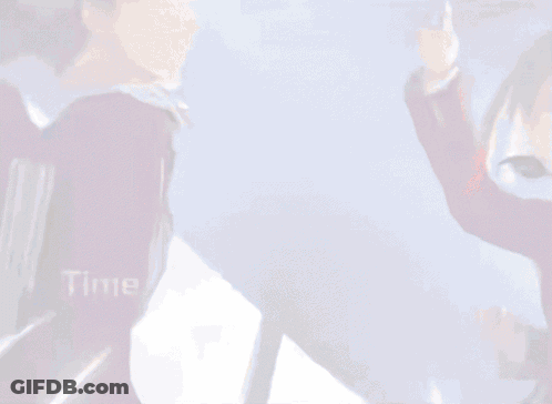 Man And Woman Standing Next To Each Other Saying Time GIF