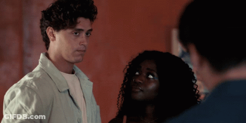 Man And Woman Standing Next To Each Other GIF