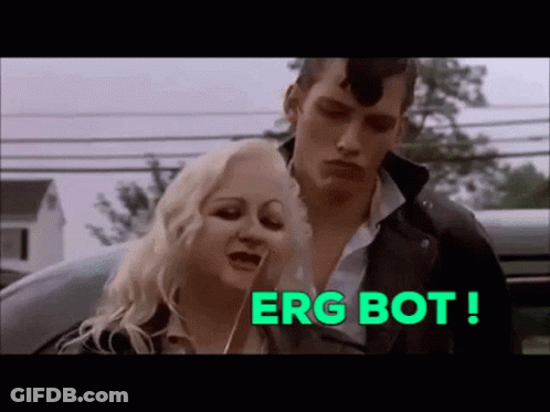 Man And Woman Standing Next To Each Other With Words Erg Bot GIF