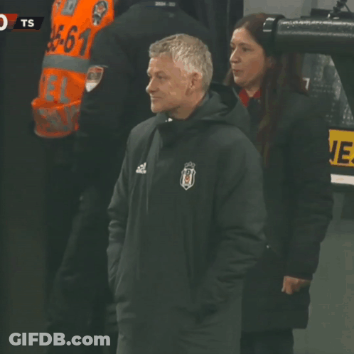 Man And Woman Standing Next To Each Other GIF