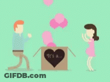 Man And Woman Standing Next To Heart Box GIF