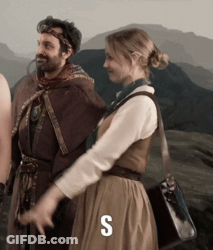 Man And Woman Standing Next To S GIF