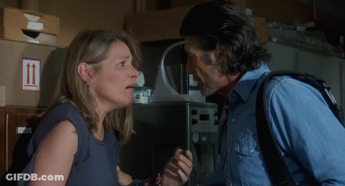 Man And Woman Standing Next To Stack Of Boxes Number 11 GIF