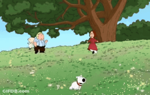 Man And Woman Standing Next To Tree GIF