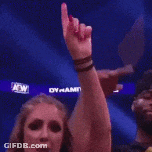Man And Woman Standing Next To Woman In Pittsburgh Shirt GIF