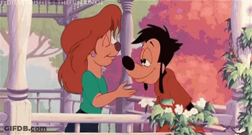 Man And Woman Standing On Balcony GIF