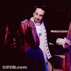 Man And Woman Standing On Stage GIF