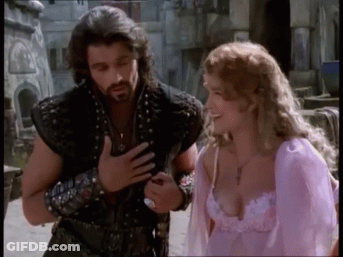 Man And Woman Standing On Street GIF