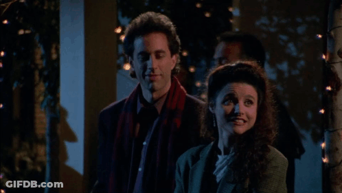 Man And Woman Standing Saying Yeah GIF