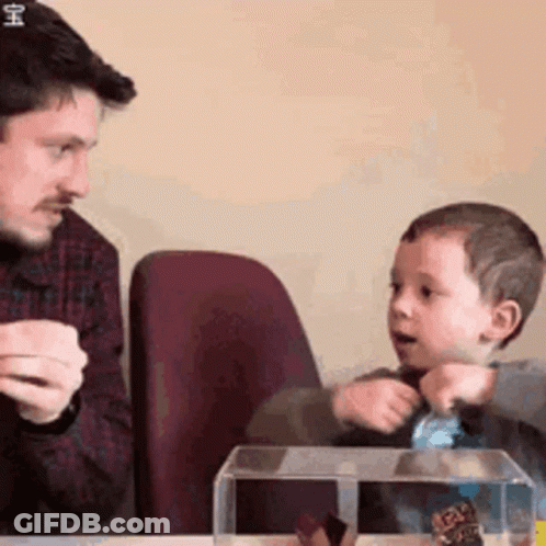 Man And Woman Standing Side By Side In Room GIF