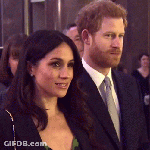 Man And Woman Standing Smiling GIF