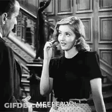 Man And Woman Standing Together In Room GIF