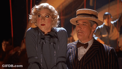 Man And Woman Standing Together GIF