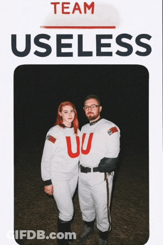 Man And Woman Standing Together Saying Team Useless GIF