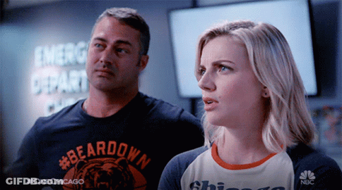 Man And Woman Standing Together With Beardown Shirt GIF