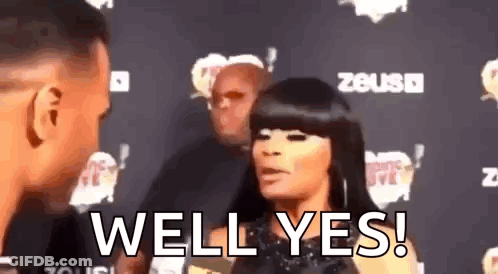 Man And Woman Standing Together Woman Saying Well Yes GIF