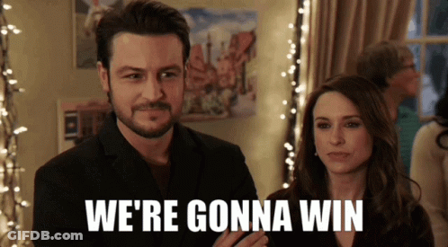 Man And Woman Standing We're Gonna Win GIF