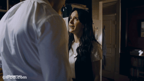 Man And Woman Standing With #Superman GIF