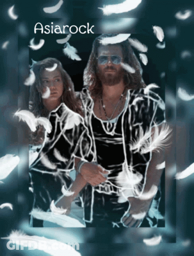 Man And Woman Surrounded By Feathers GIF