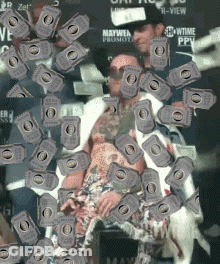 Man And Woman Surrounded By Showtime Tickets GIF