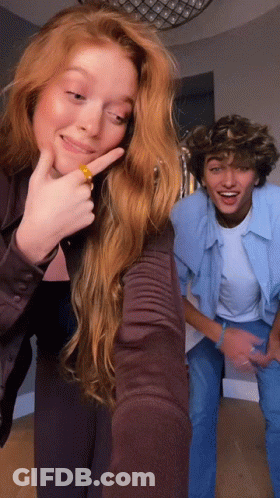 Man And Woman Taking Selfie GIF
