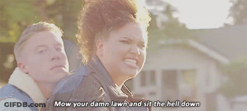 Man And Woman Talking About Mowing Lawn GIF