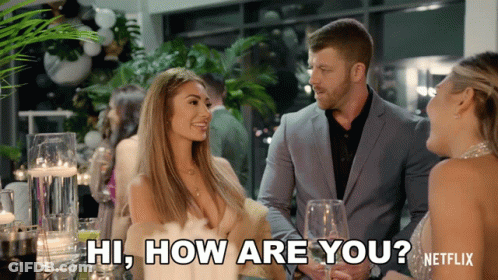 Man And Woman Talking At Party GIF